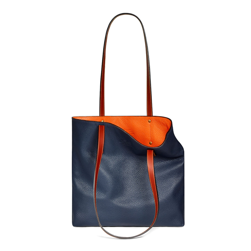 navy-and-orange leather tote bag