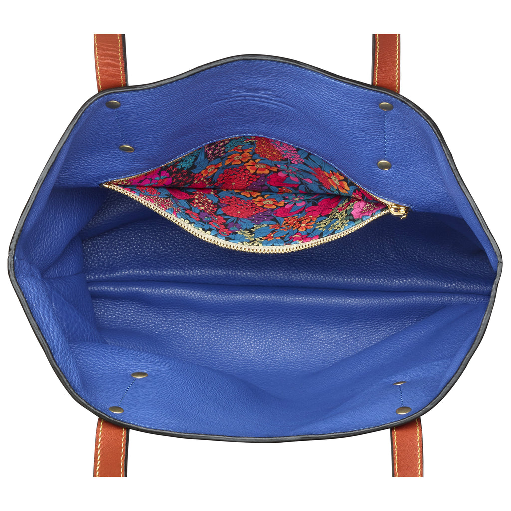 black-and-royal-blue leather reversible shoulder bag